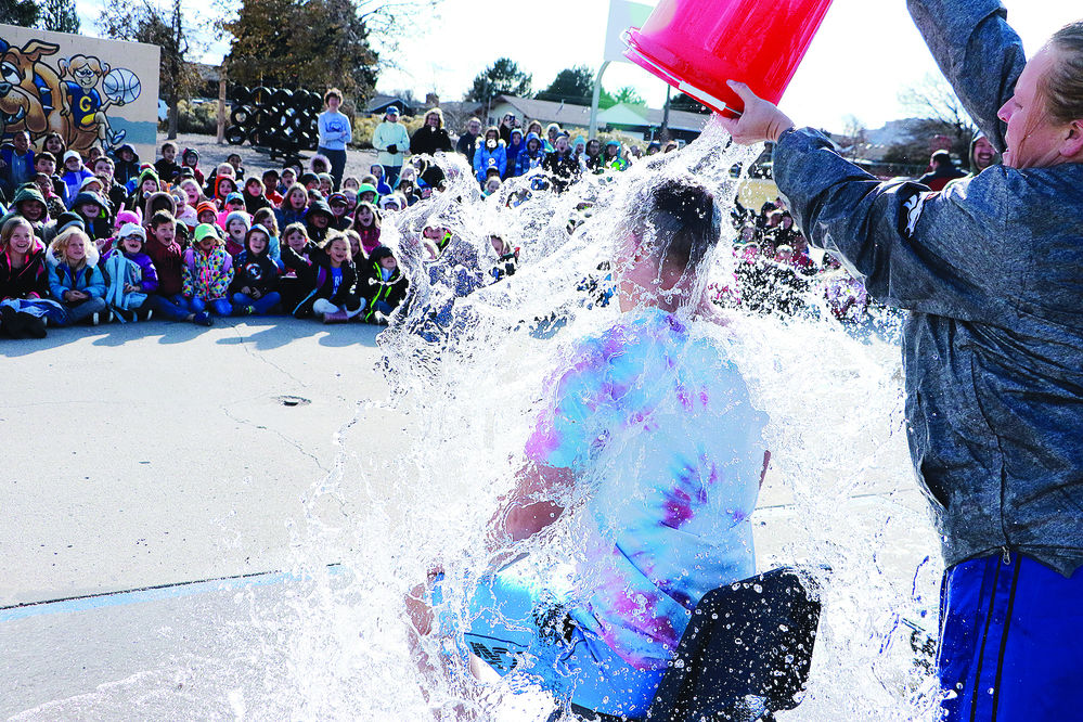 Gering teachers get doused after challenge
